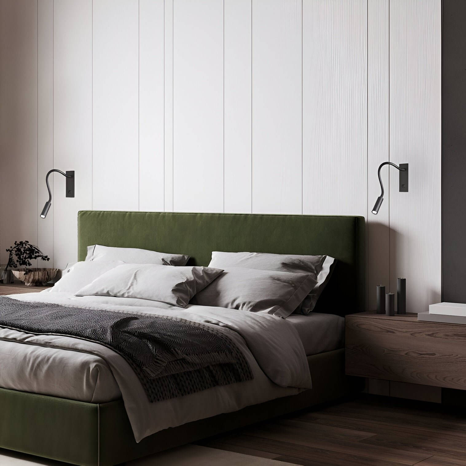 Modern bedroom with green upholstered bed frame, white paneled walls, grey bedding, and two black wall-mounted reading lamps.