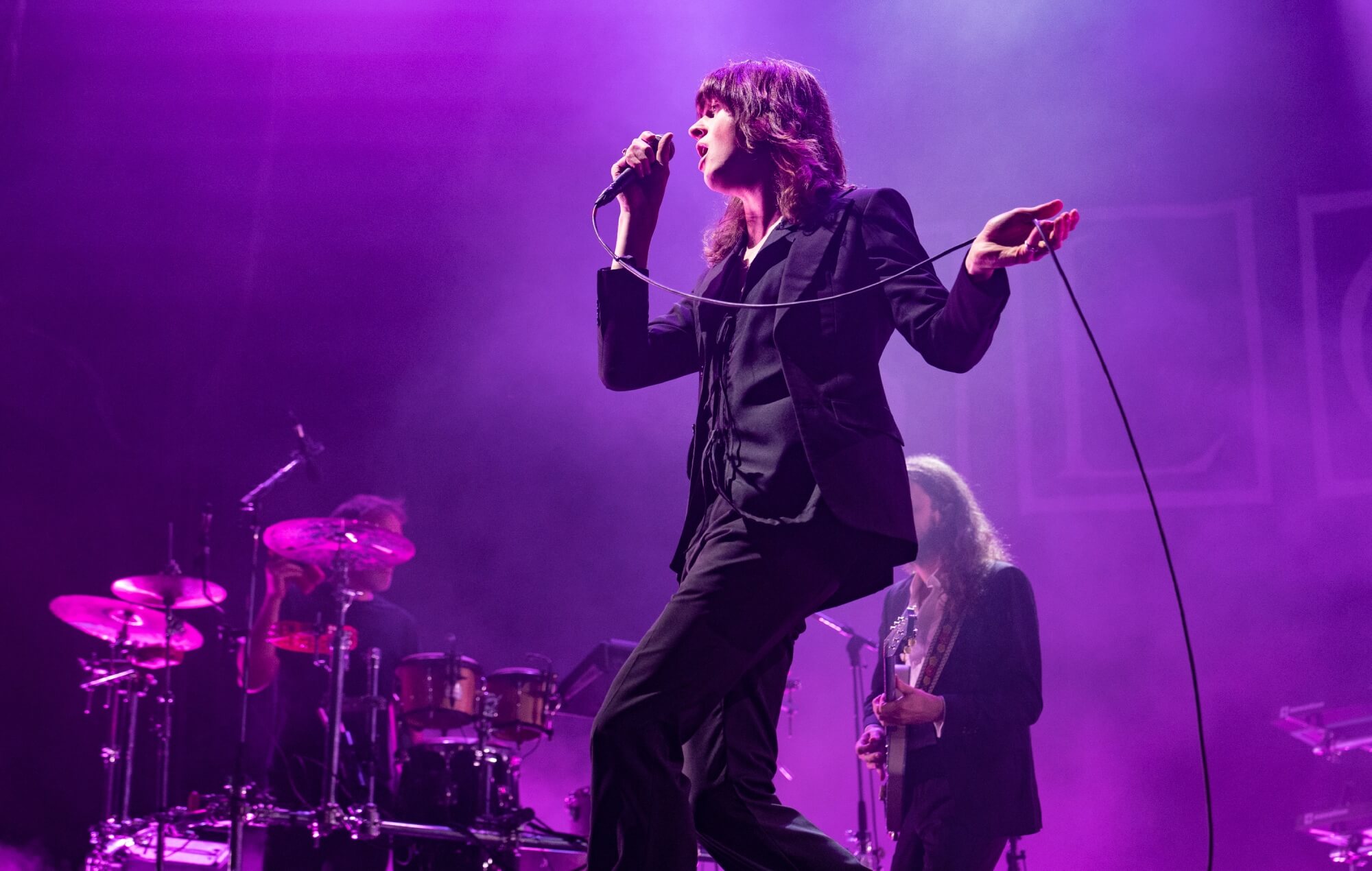Tom Ogden performing live on stage with Blossoms