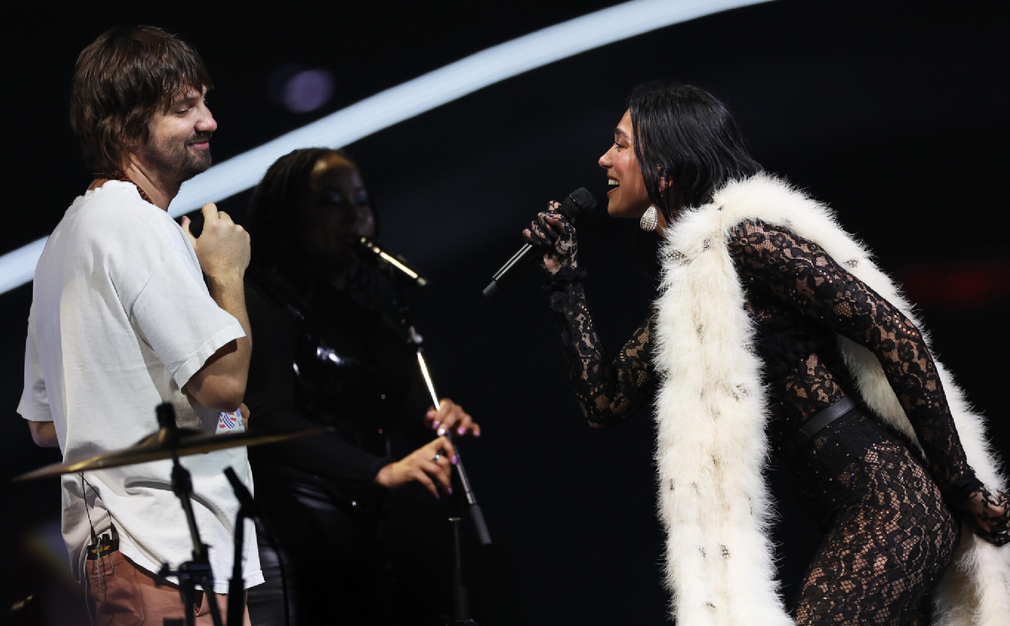 Dua Lipa performs alongside Kevin Parker of Tame Impala. Credit - Don Arnold/Getty Images
