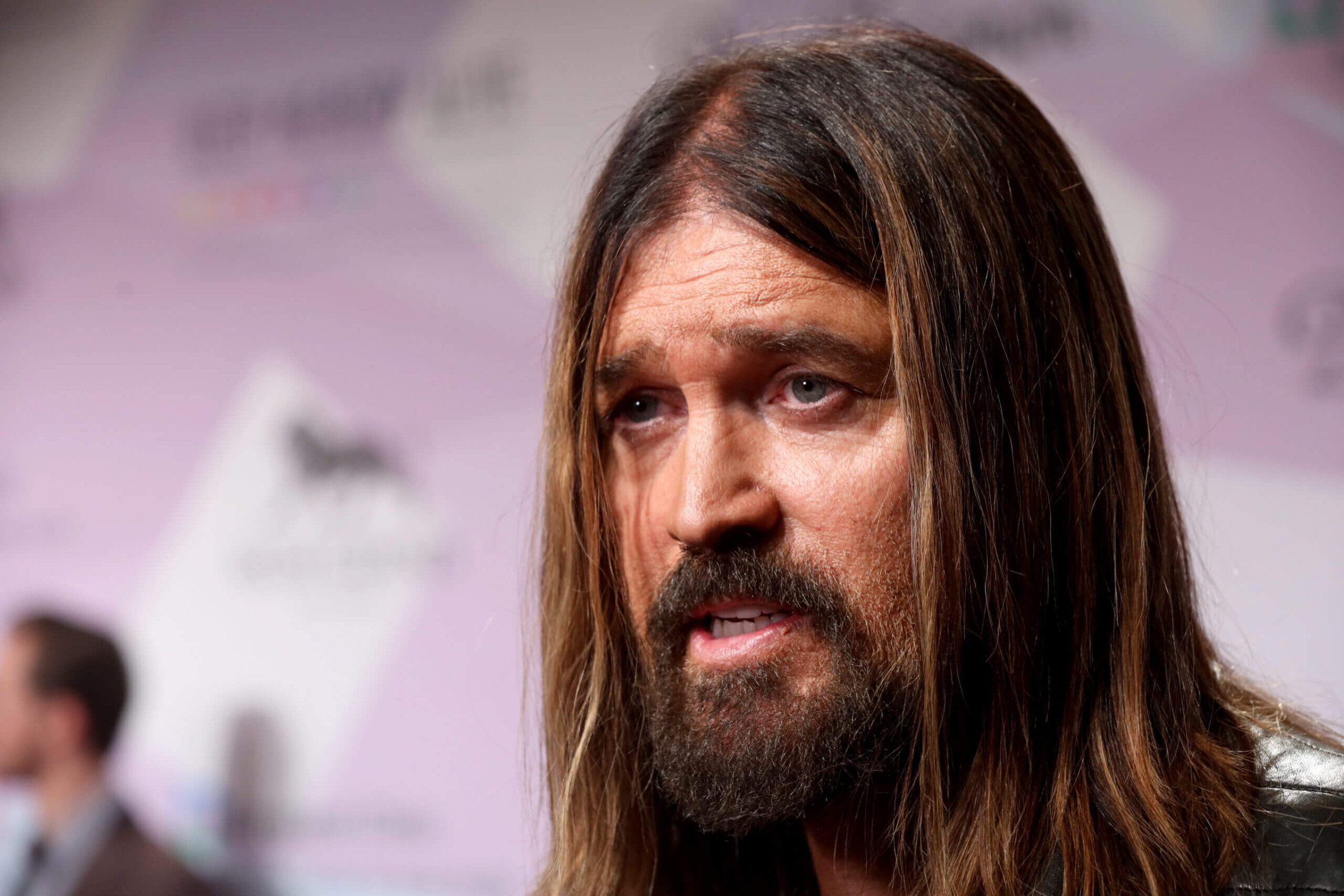 Billy Ray Cyrus with daughters