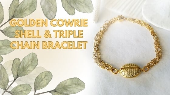 ​Golden Cowrie Shell & Triple Chain Bracelet