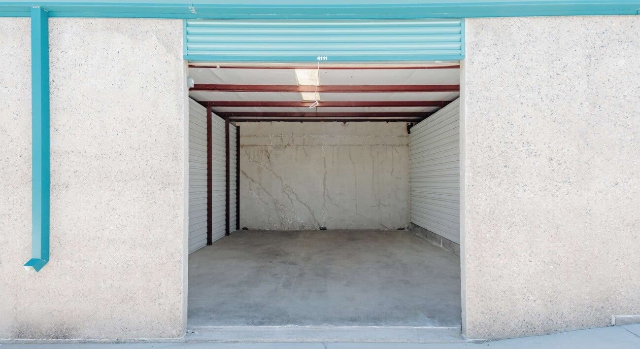 Step-by-step couch wrapping with plastic film, padding, and bubble wrap at STORAGExperts Prescott Valley, Arizona storage units.