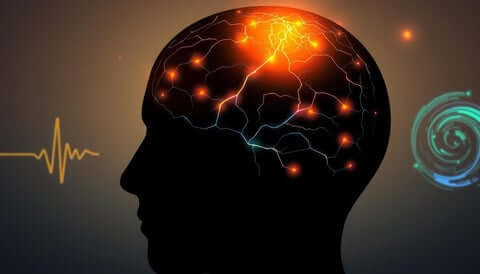 Silhouette of human head with glowing brain activity.