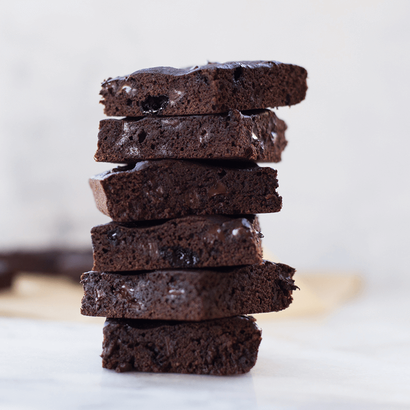 A photo of a stack of Healthy Dark Chocolate Brownies