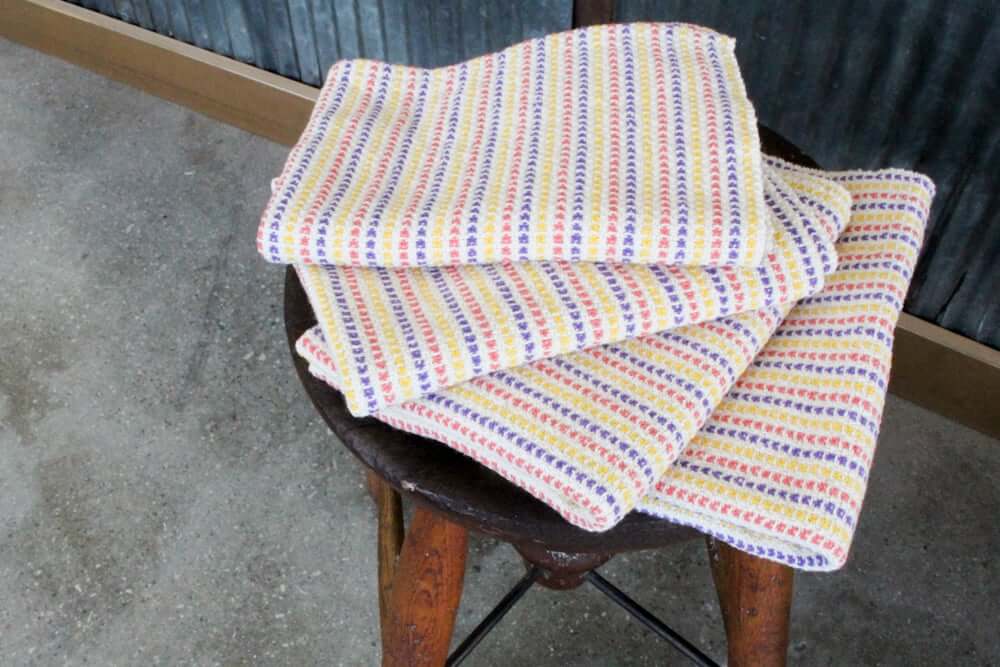 Dishtowels Displayed on a stool