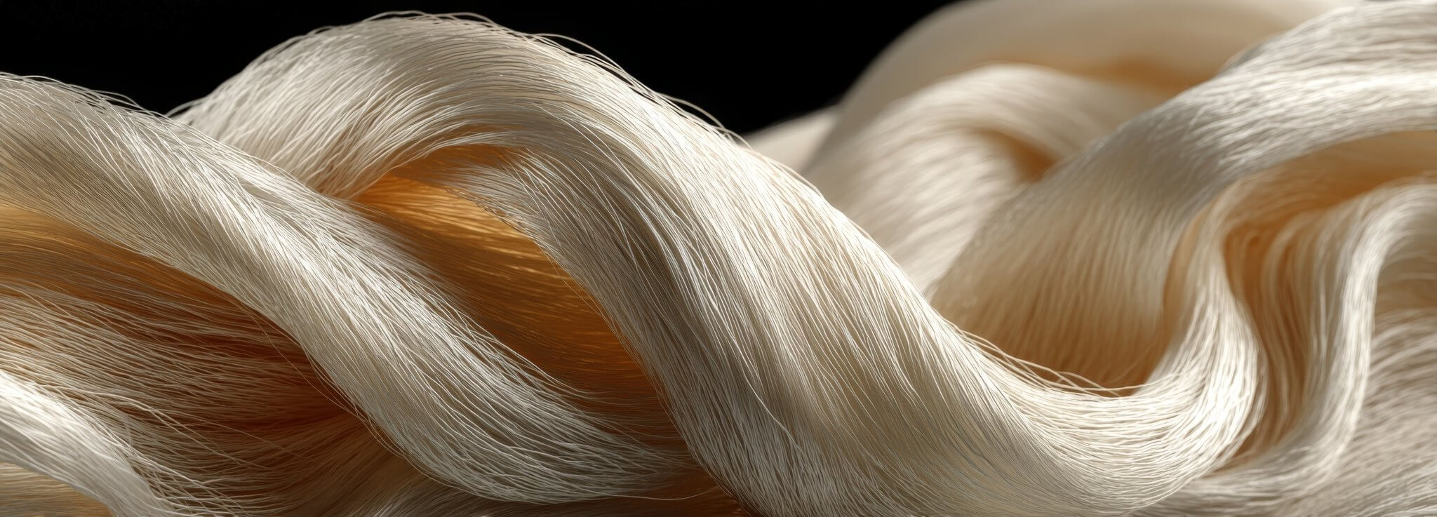 Close-up of beige TENCEL fabric used in a curated capsule wardrobe hoodie