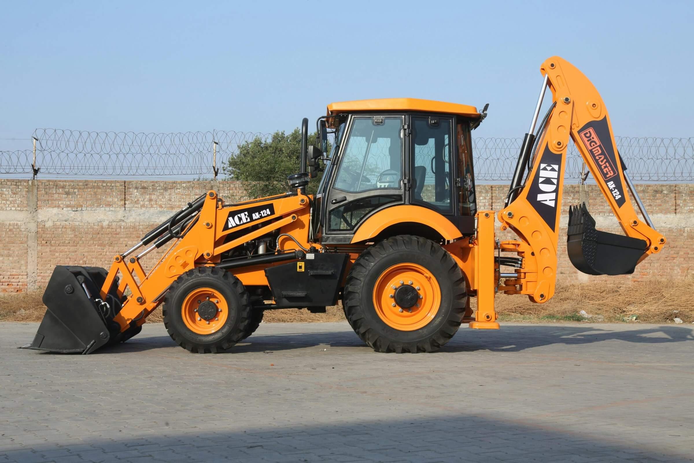 Large backhoe loader (heavy equipment) with varying price range (beneficial financial planning consideration).