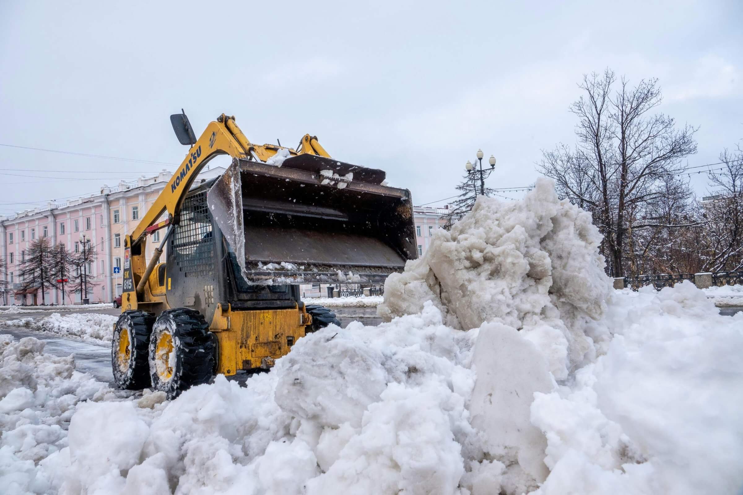 Heavy equipment pushing snow.