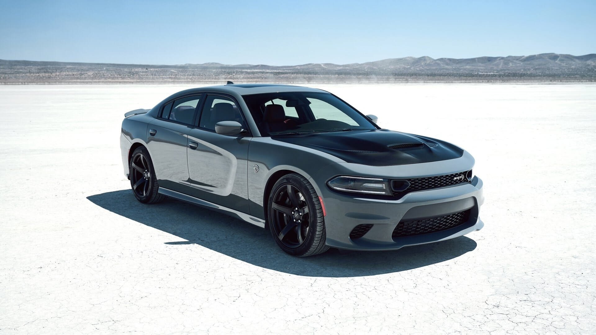 Silver Dodge Charger SRT, offering power and style.