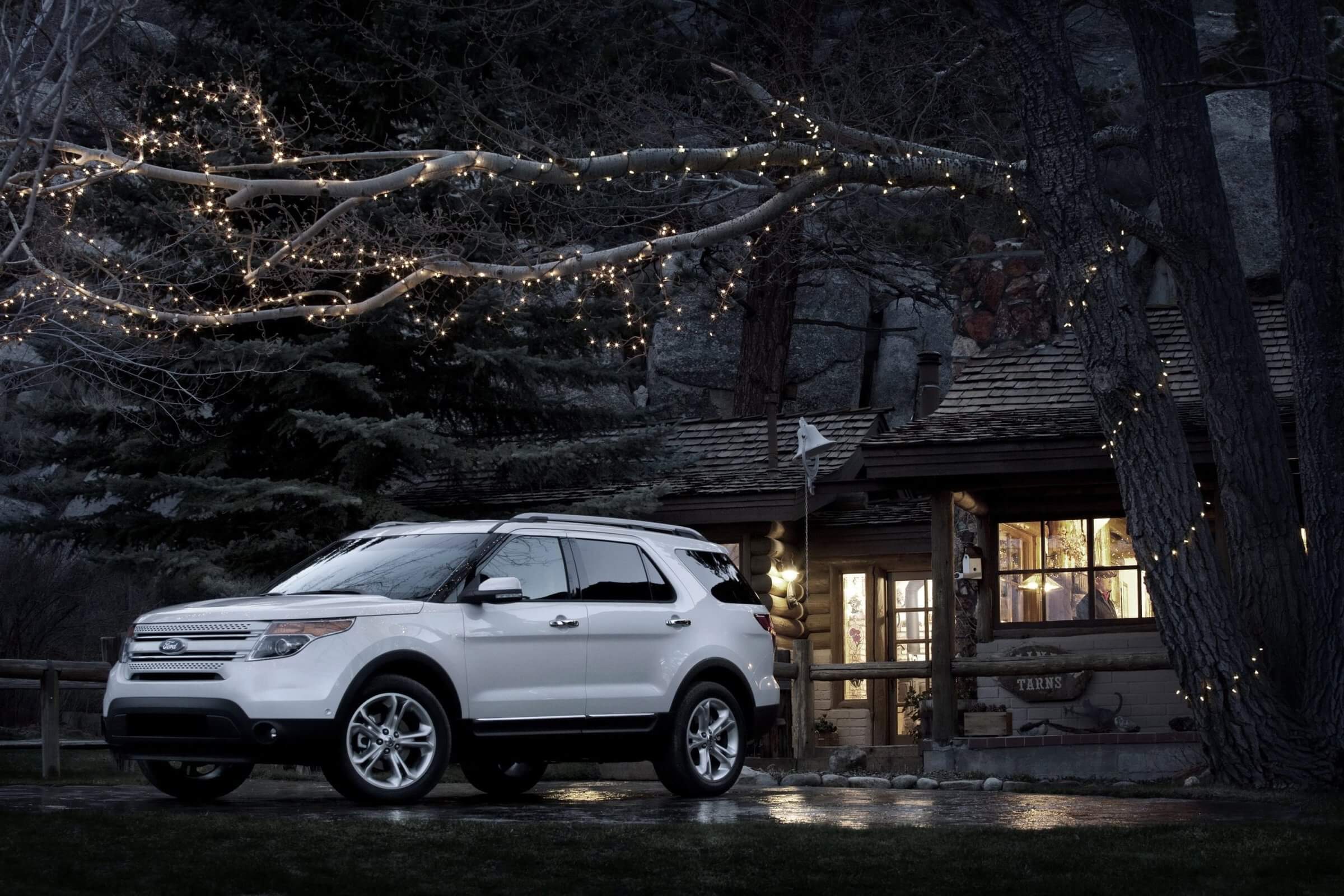 White vehicle with aftermarket accessories and trailer tow package, which you can consider taking for a test drive.