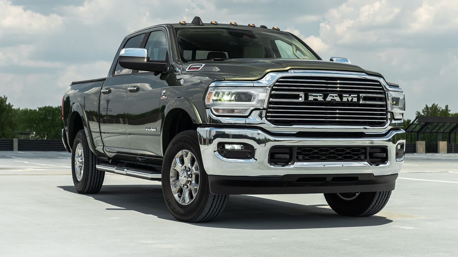Black Ram truck with 6.4-liter HEMI V-8 engine, four wheels, brakes, and ability to carry up to max five passengers.