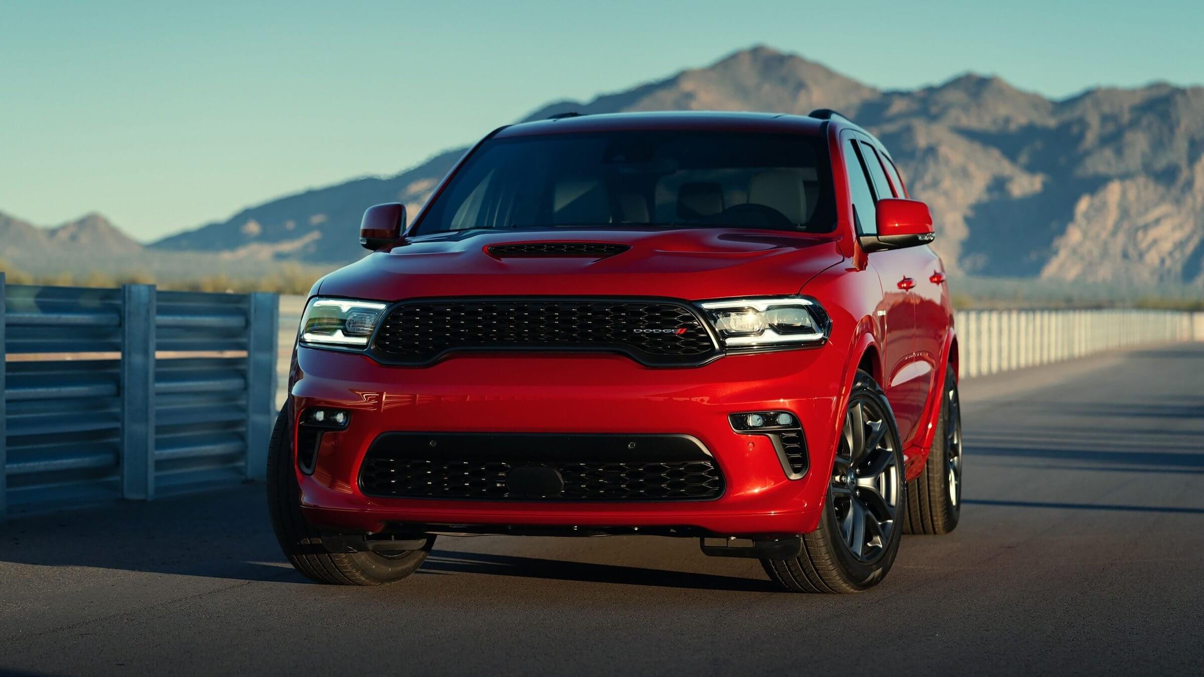 2021 Dodge Durango parked at sunset among the mountains.