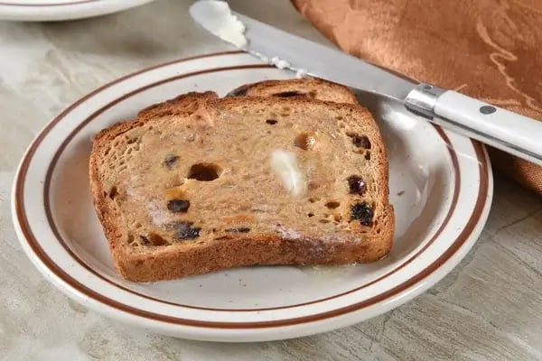 Homemade cinnamon raisin bread made with honey, oats, cinnamon, and raisins