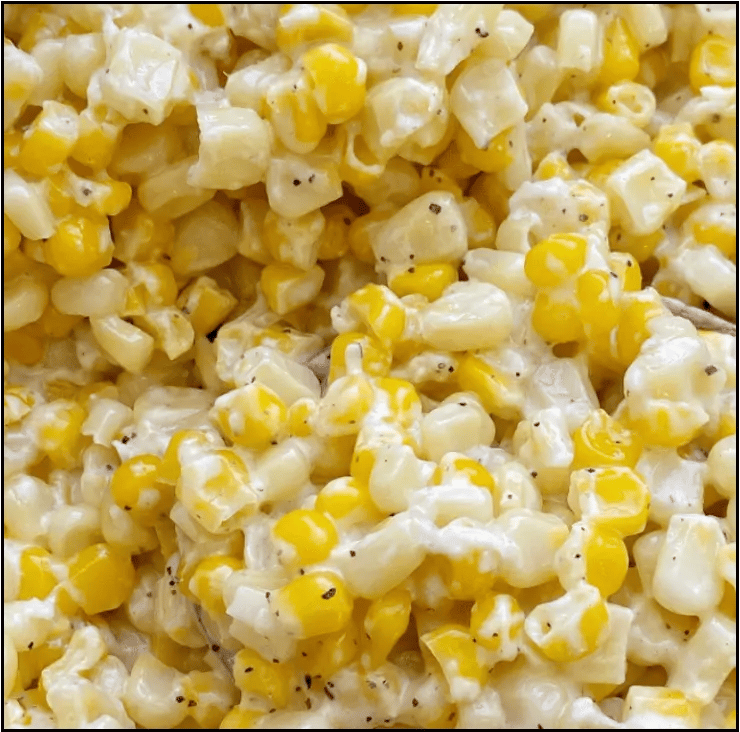 Honey butter skillet corn made with sweet corn, butter, honey, and cream cheese