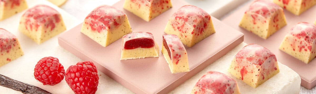 Vanilla and raspberry white chocolate bon bons