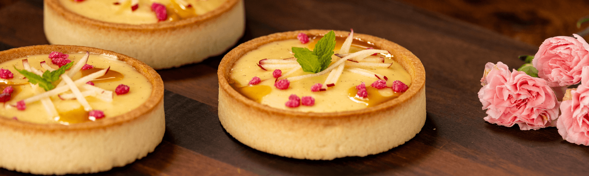 Creme brulee tartlet with Persian spiced apple compote