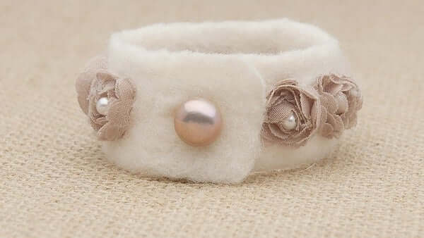 Felt and pearl cuff that Hisano created and wore at her wedding