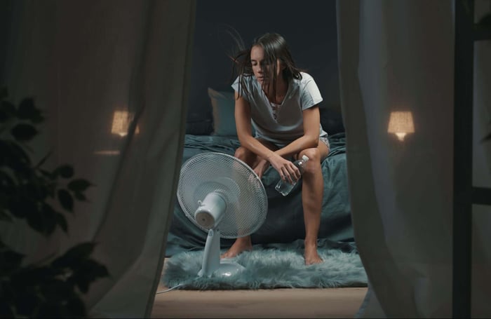 Woman Stressing Because She's Hot and Can't Sleep