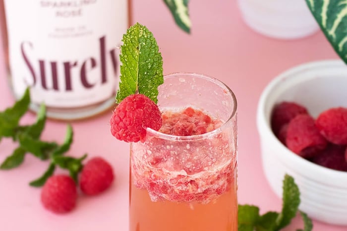 The Perfect Non-Alcoholic Bellini + Garnishes for All Seasons