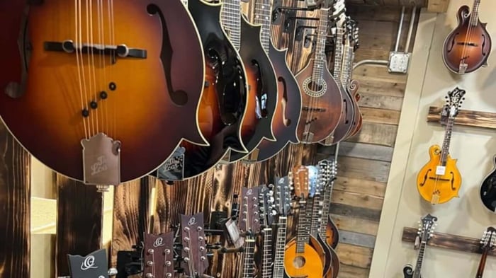 Mandolin Store The Acoustic Shoppe Mandolin Room showing many a-style and f-style mandolins hanging.