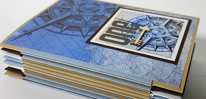 Create a handmade book with the Cartography collection.