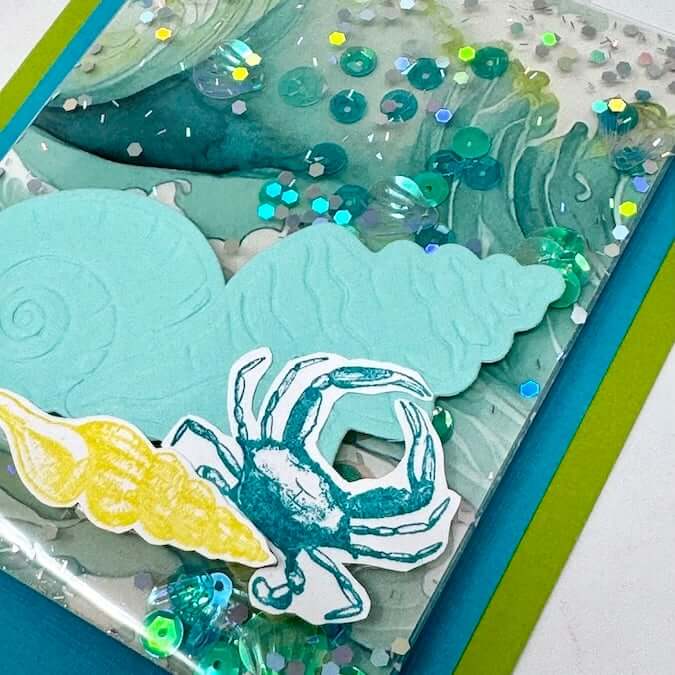 Make a shaker flap card with the Beachcomber collection.