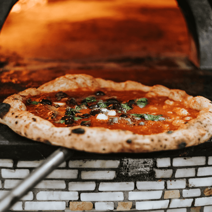 Celebrate National Pizza Day With an Outdoor Pizza Oven