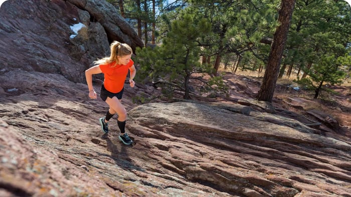 Athlete wearing kinesiology tape vs compression sleeve alternative - GO Sleeves during daily training