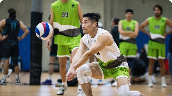 Player wearing knee sleeves practicing movement care for volleyball