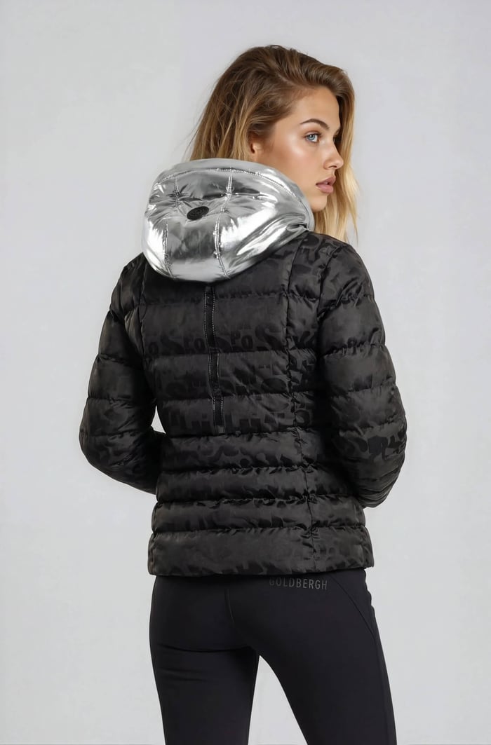 How to shop a ski wear sale and save lots and a lad in black and silver ski jacket