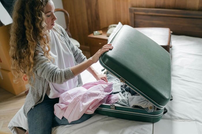why bring a travel iron for your trip