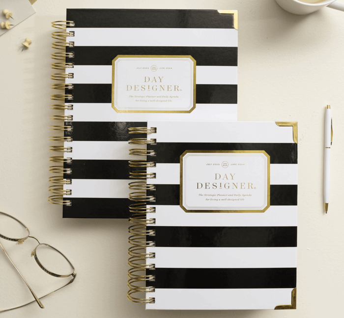 which planner size is best for you, stacked blush day designer planners with gold binding,