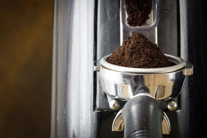 Ground coffee in a portafilter