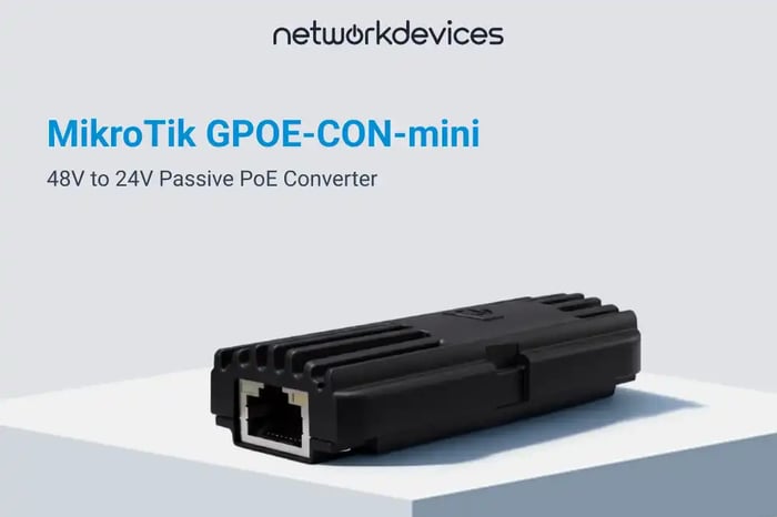 MikroTik GPOE-CON-mini 48V to 24V Passive PoE converter with black finned housing and RJ45 port on a white display block