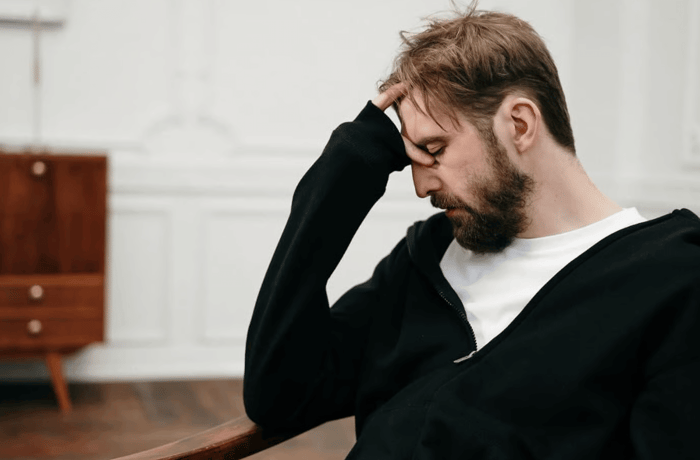 Anger management for mental health clients learning coping skills with a therapist during a counseling session.