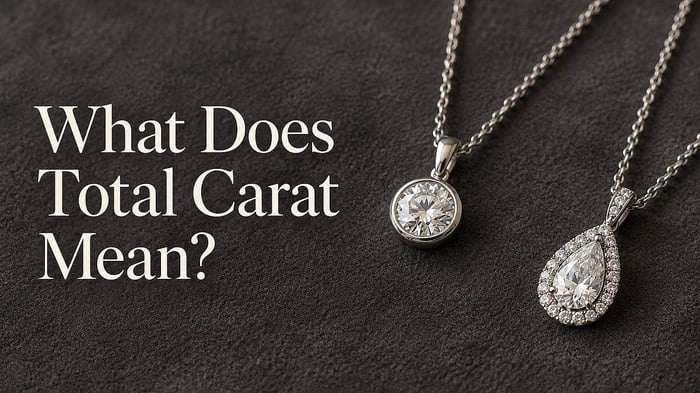 A single-diamond pendant beside a halo pendant, with the headline “What Does Total Carat Mean?