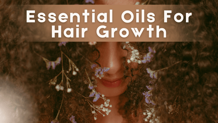 Essential Oils for Hair Growth, with image of a woman with beautiful thick curly hair and flowers in her hair