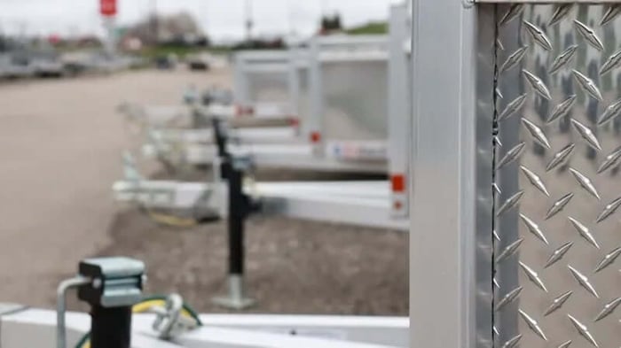 Close up of trailer hitches in a yard