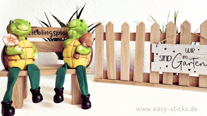 Bastelidee aus Holzklötzchen: Wir sind im Garten