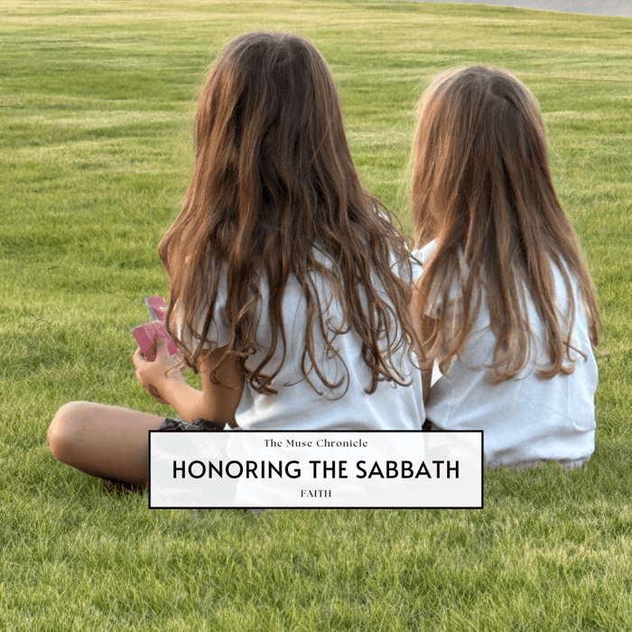 Two young girls sitting together on green grass at sunset, symbolizing peace, family, and faith as part of a story on honoring the Sabbath.