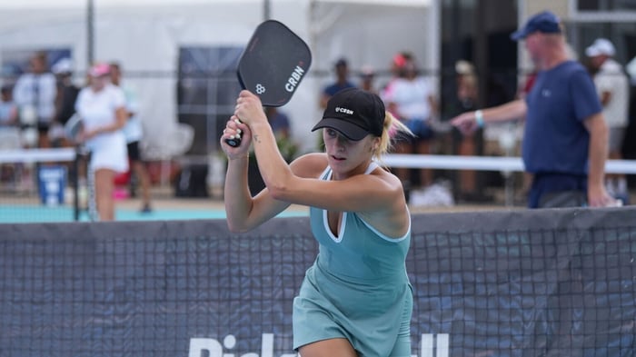 Hannah Blatt about to swing pickleball paddle