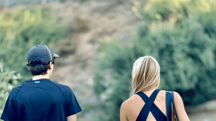 Pickleball players facing away