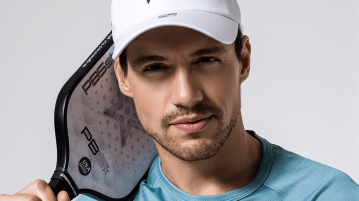 Pickleball player holding a paddle