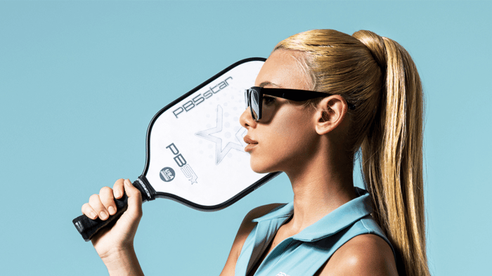 Pickleball player holding a paddle