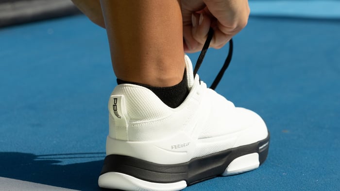 Close up shot of shoe laces being tied
