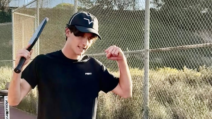 Man celebrating after winning a pickleball match