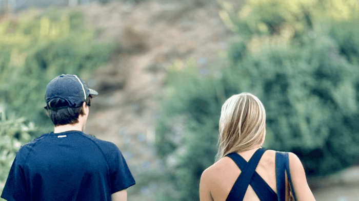 Pickleball players facing away