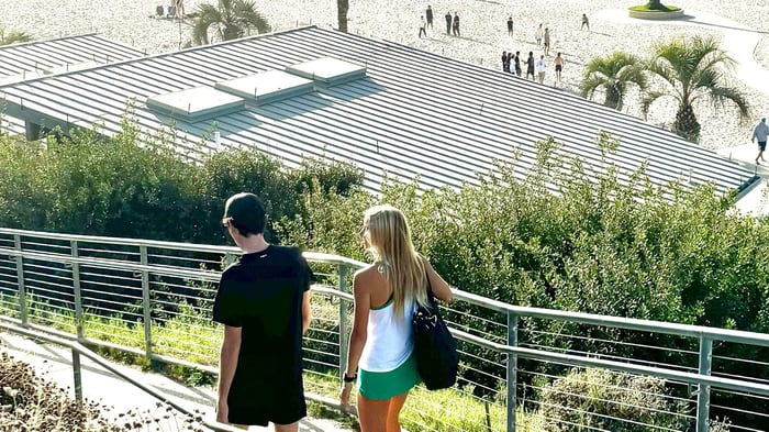 Two pickleball players headed home after a game