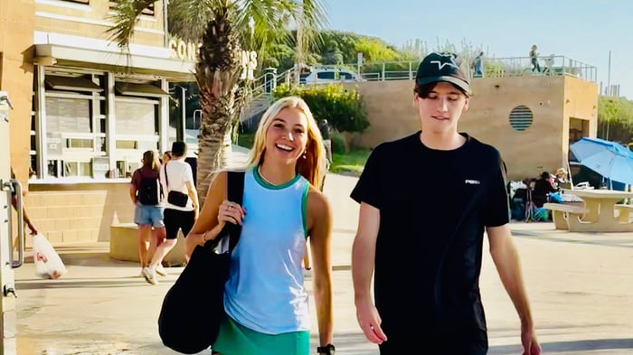 Two pickleball players discussing game strategies