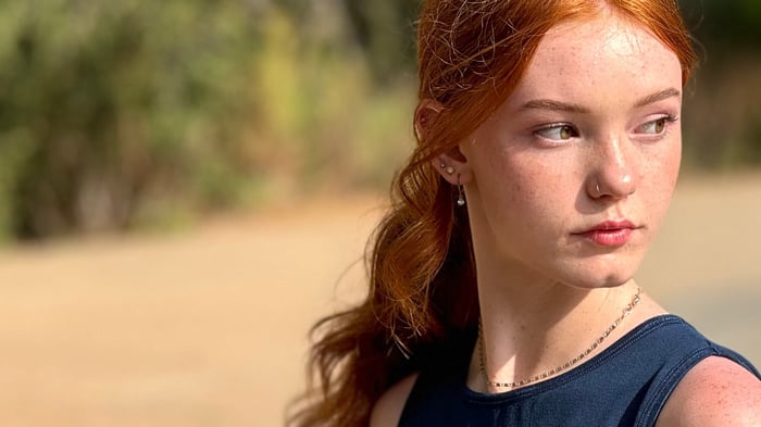 Female pickleball player under the sun